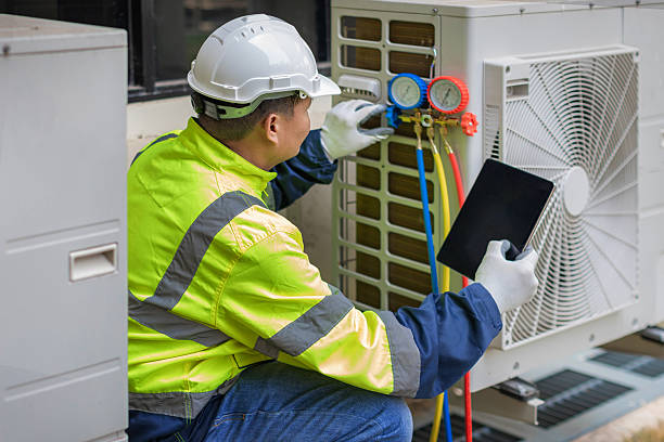 Professional Heat Pump Repair technician working in Auburn, AL